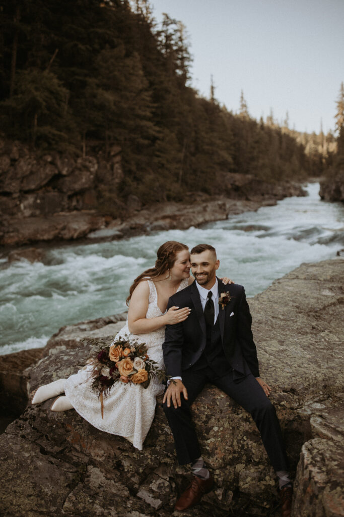 bride kissing the groom on the cheek