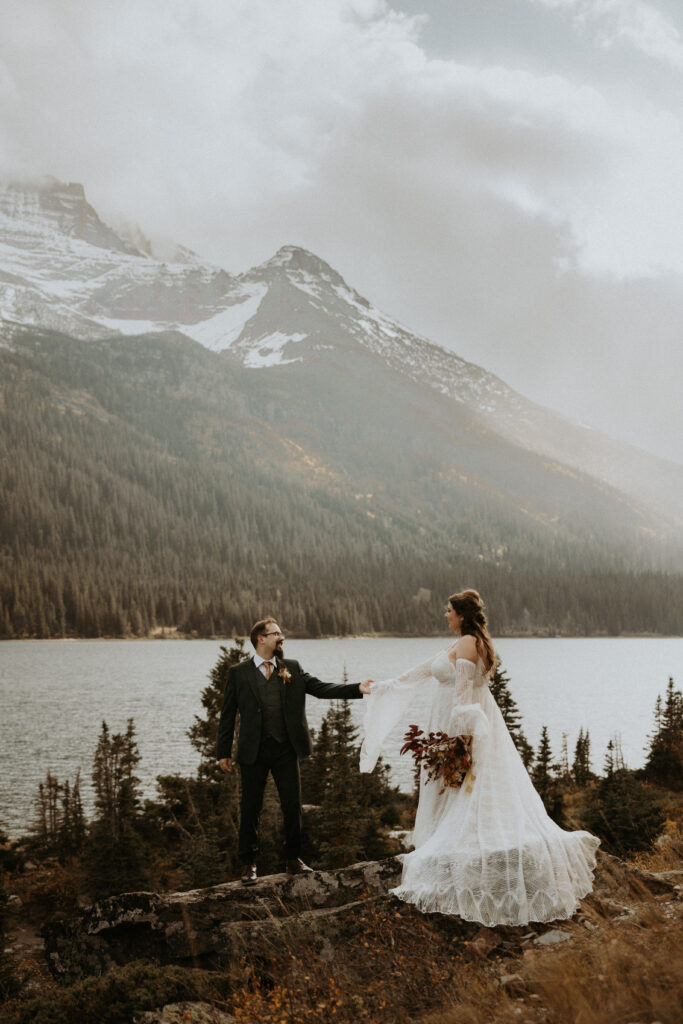 newlyweds holding hands during their bridal session