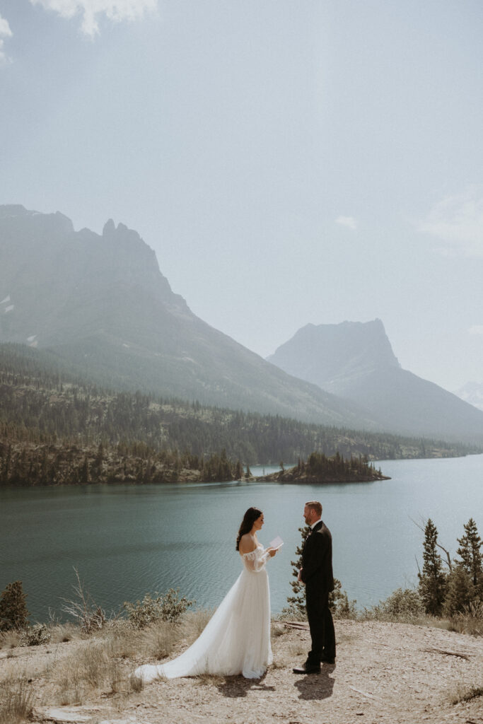Bride and groom at their private vows at glacier national Park