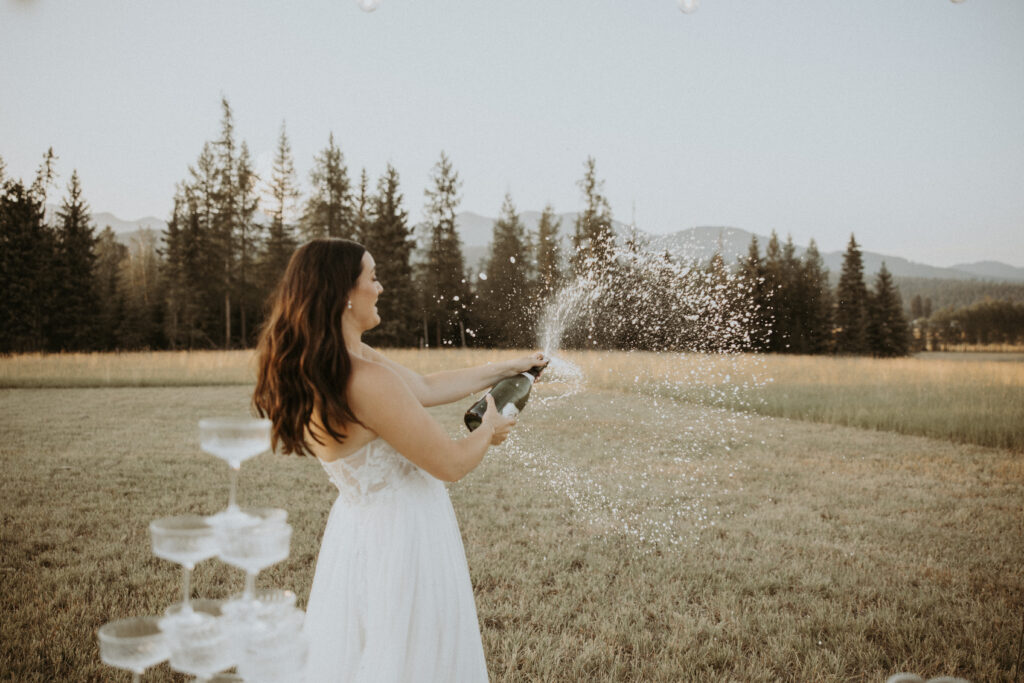 bride celebrating with champagne