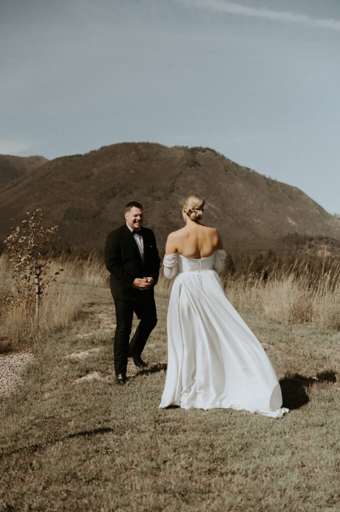 bride and groom at their first look