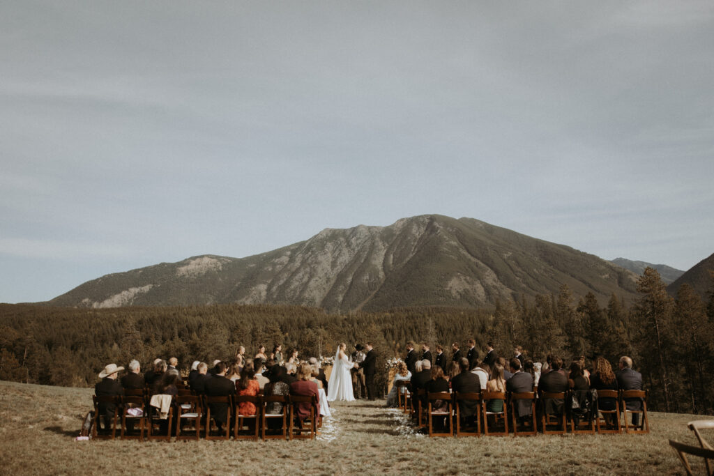 Bride and groom holding hands at their ceremony