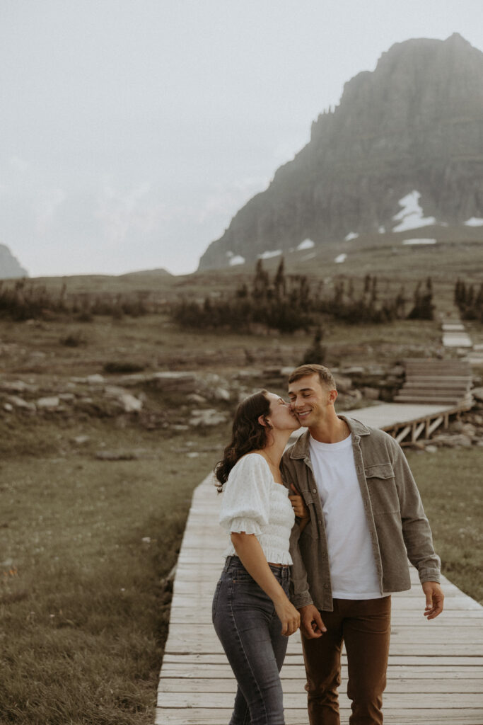 fiance kissing her fiance on the cheek
