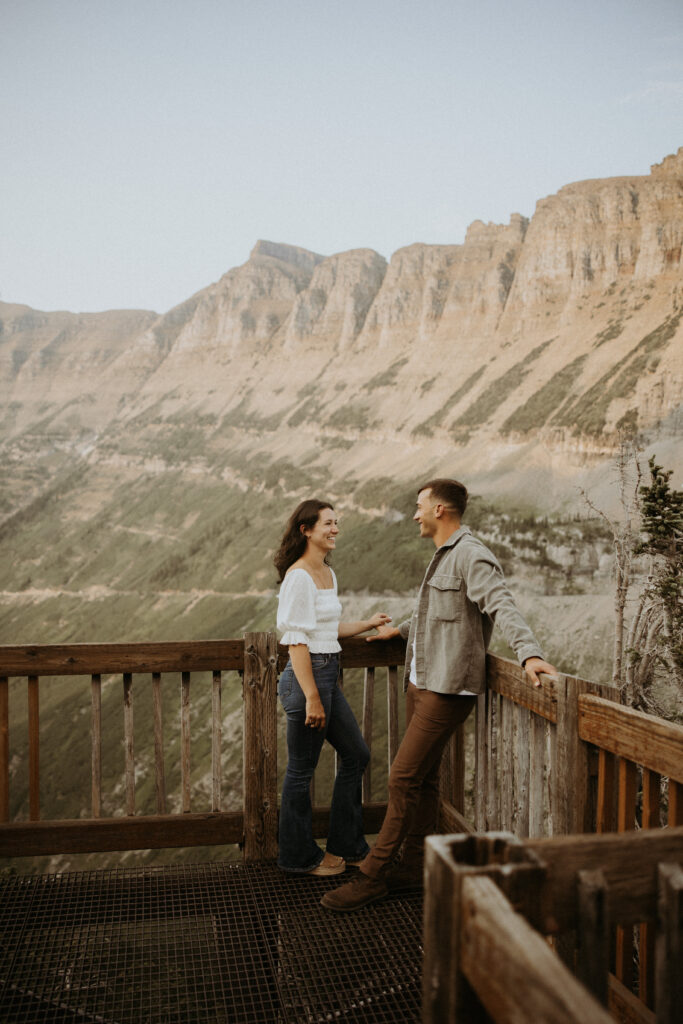 cute picture of the newly engaged couple smiling