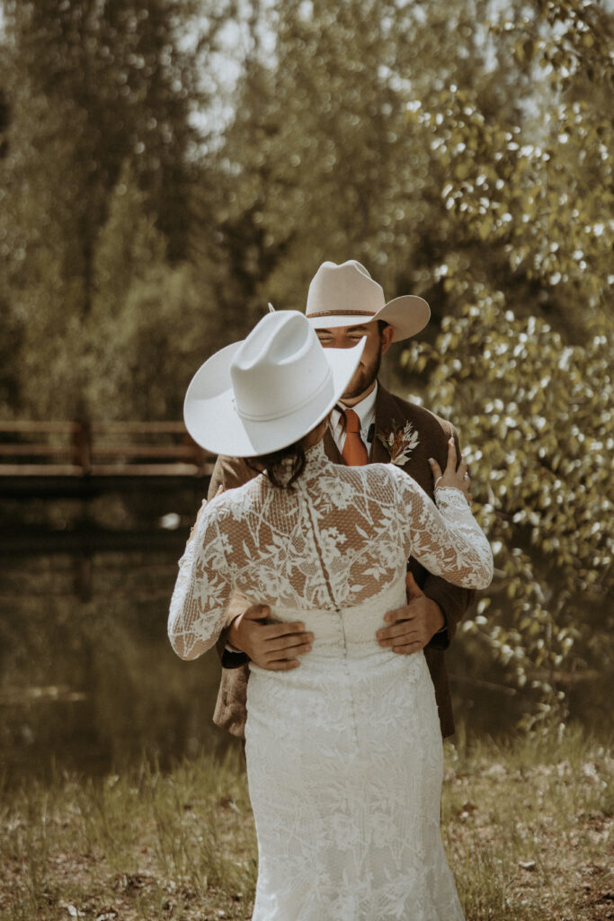 cute picture of the couple hugging during their first look