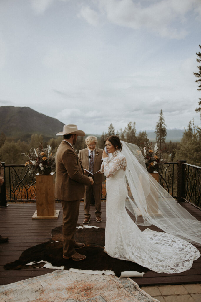 bride emotional during her wedding ceremony