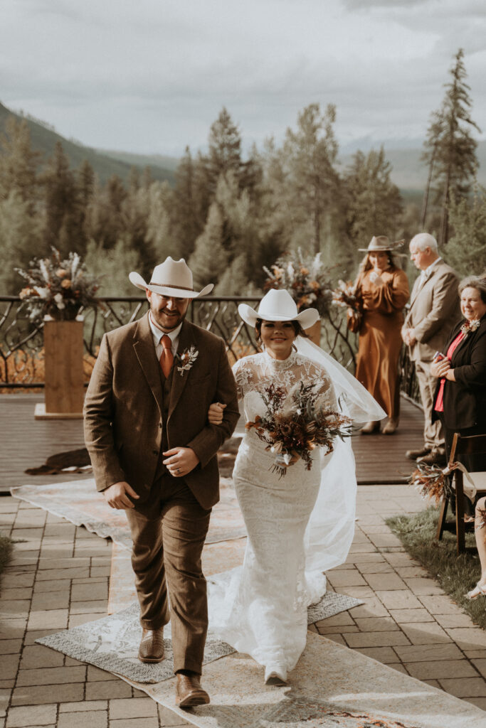 cute picture of the newlyweds heading to their reception