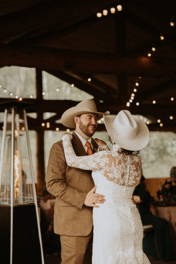 cute picture of the newlyweds smiling at each other