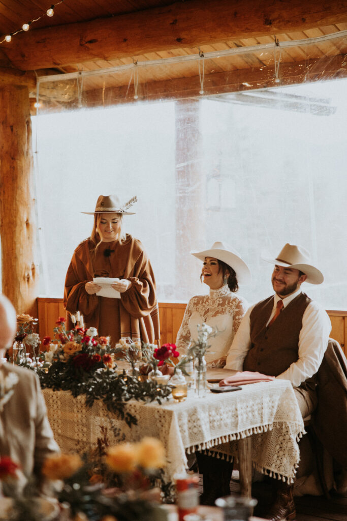 newlyweds emotional at their reception during their guests speeches