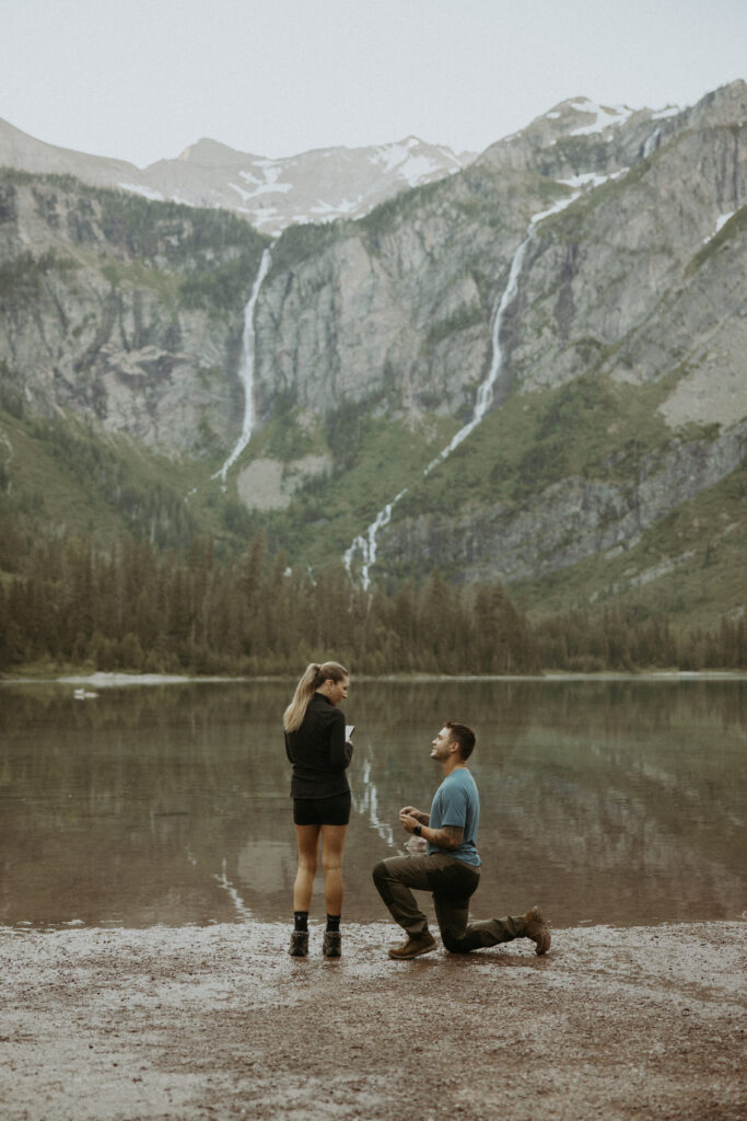 happy couple at their proposal in glacier park