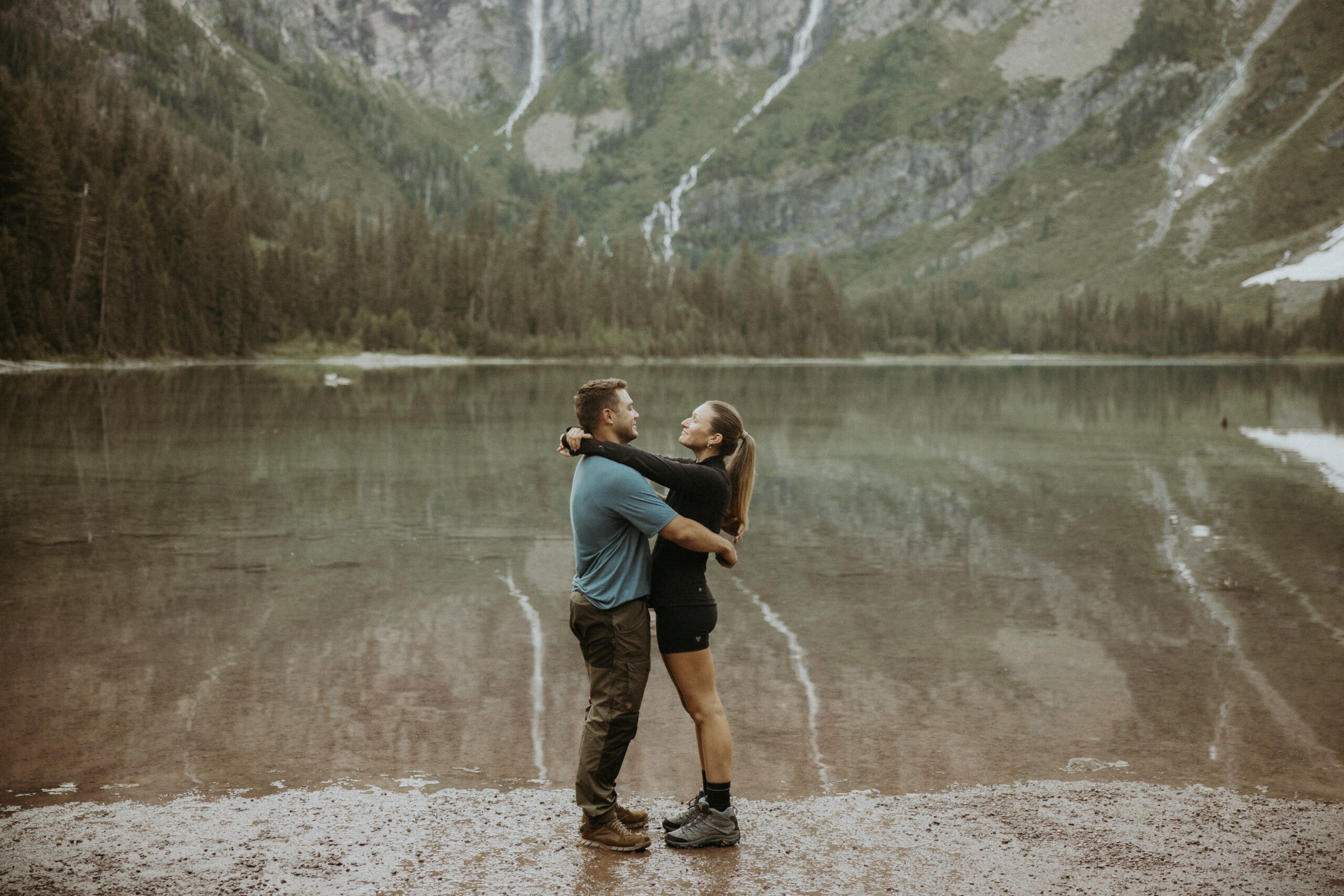 picture of the newly engaged couple hugging