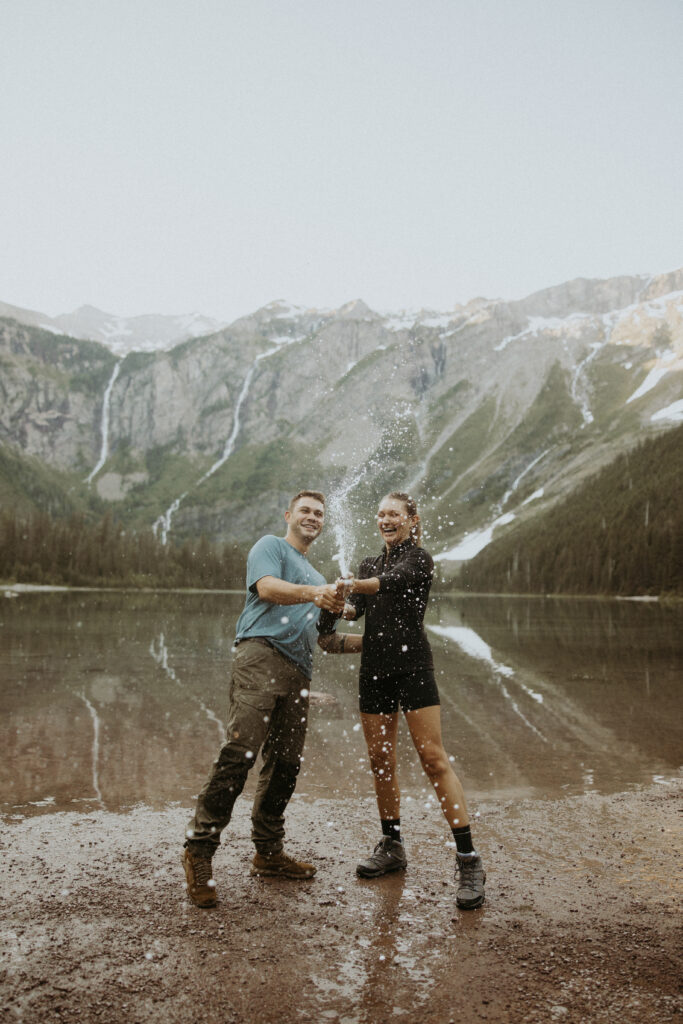 newly engaged couple celebrating their proposal with champagne
