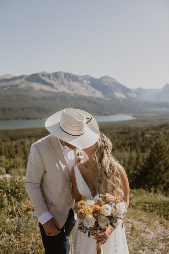 Portrait of the newlyweds, kissing