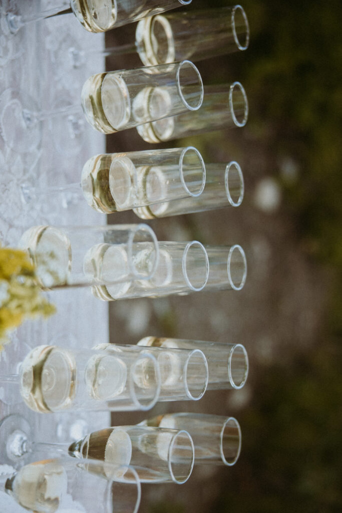 Couple celebrating their elopement with champagne