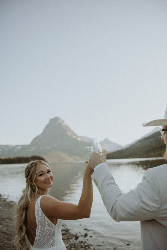 Newlyweds celebrating with champagne