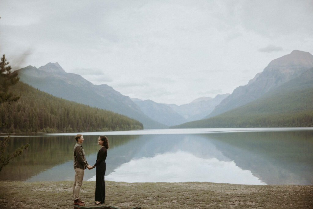 Picture of the newly engaged couple holding hands