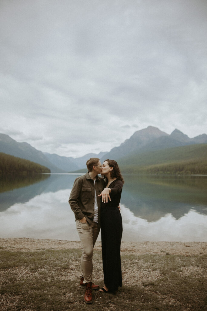 couple showing their engagement ring