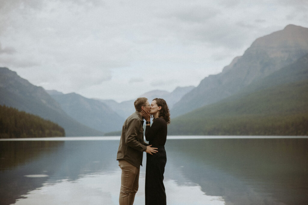Stunning picture of the newly engaged couple kissing