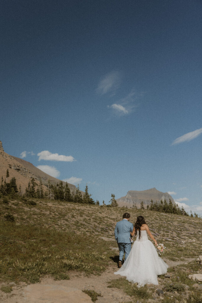 picture of the bride and groom holding hands