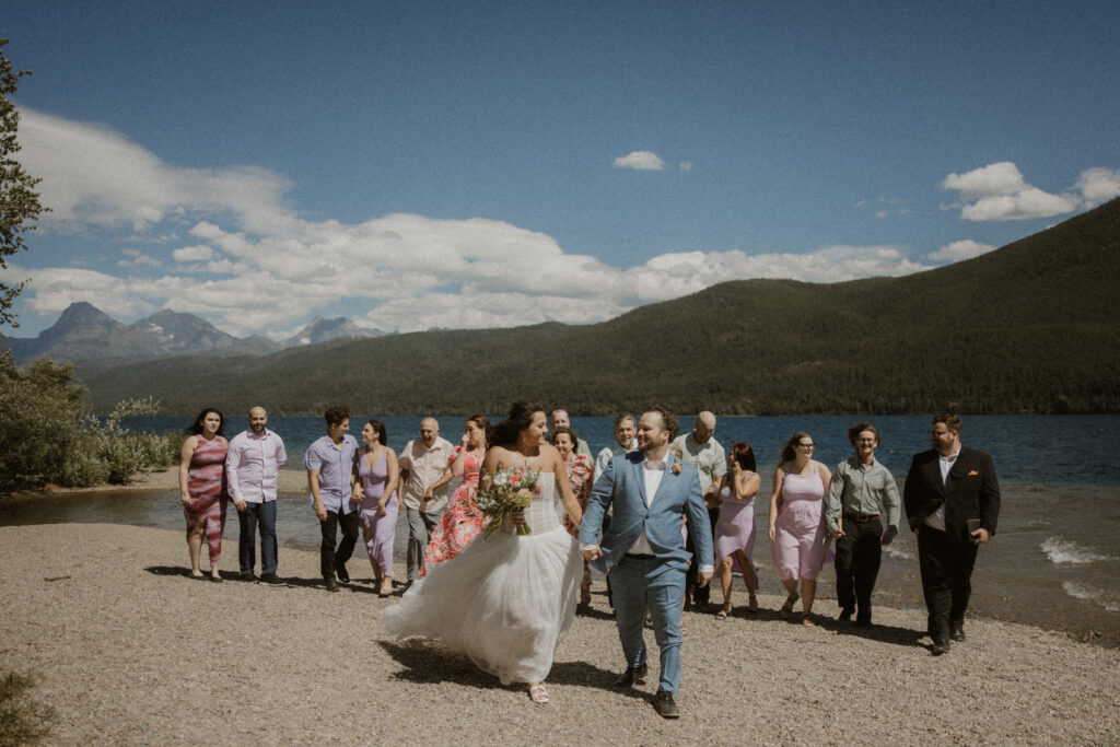 cute picture of the bride and groom with their wedding guests