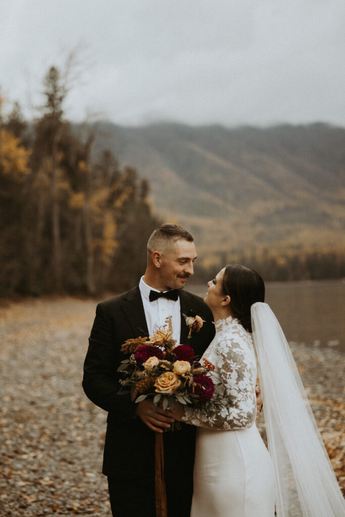 Cute picture of the newly married couple, smiling at each other