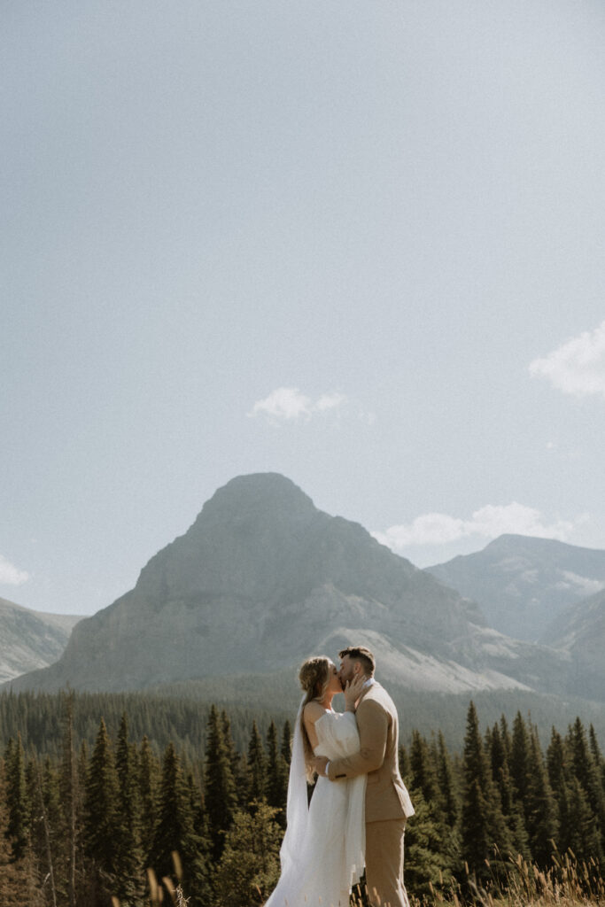 Bride and groom, kissing after their ceremony