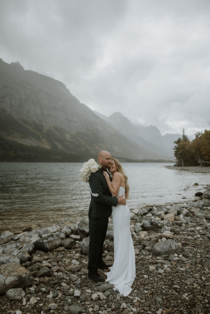 cute picture of the bride and groom hugging