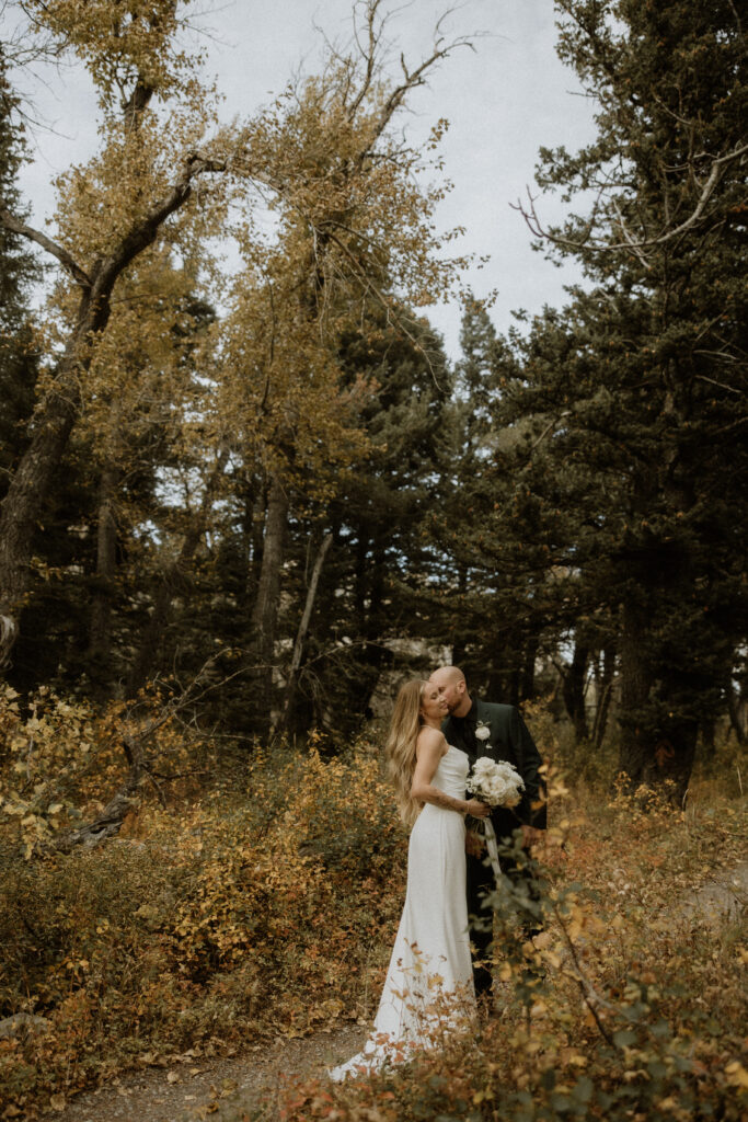 cute picture of the newlyweds kissing