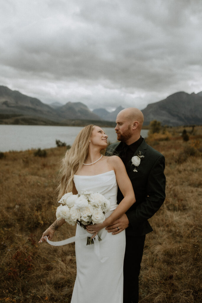 cute picture of the couple smiling at each other 