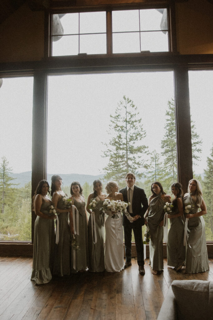 cute picture of the bride and groom with the bridesmaids