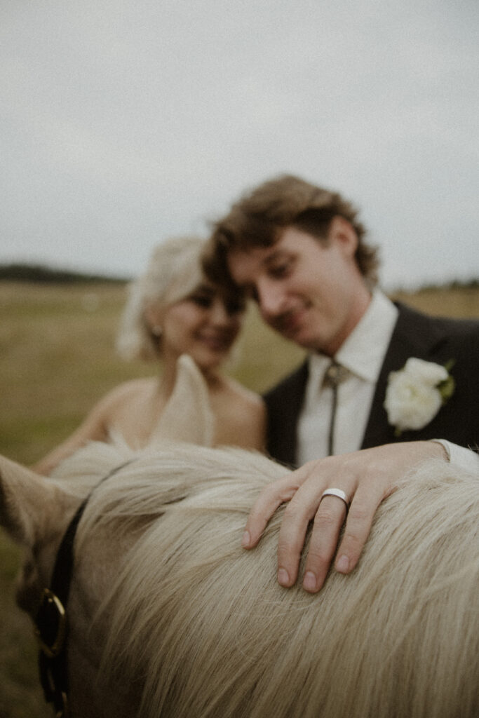 cute picture of the bride and groom smiling at each other