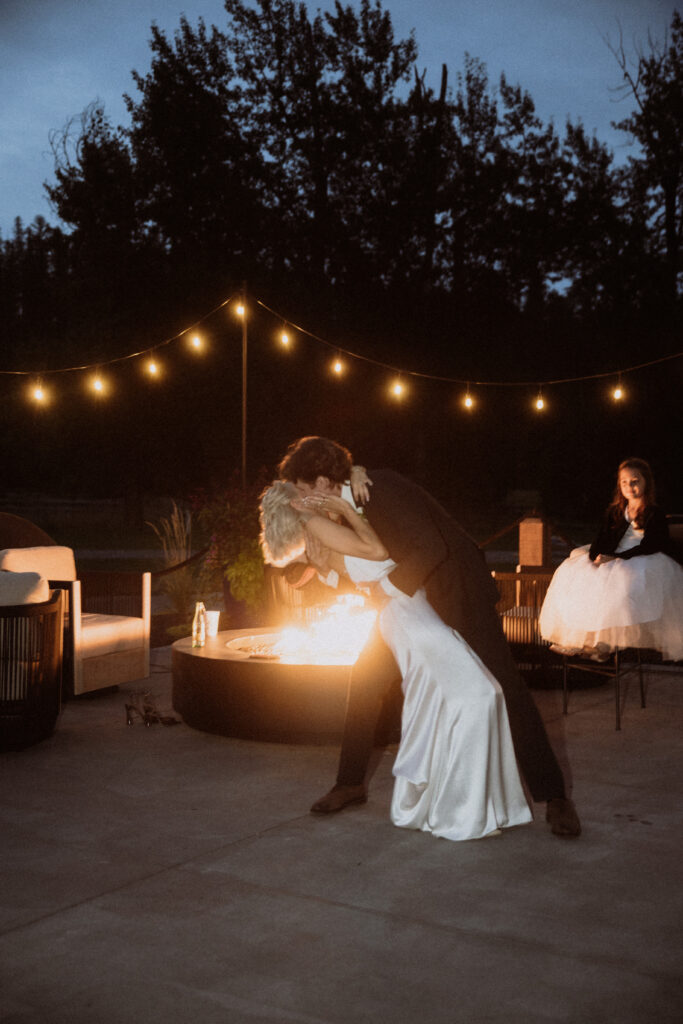 cute picture of the newlyweds kissing