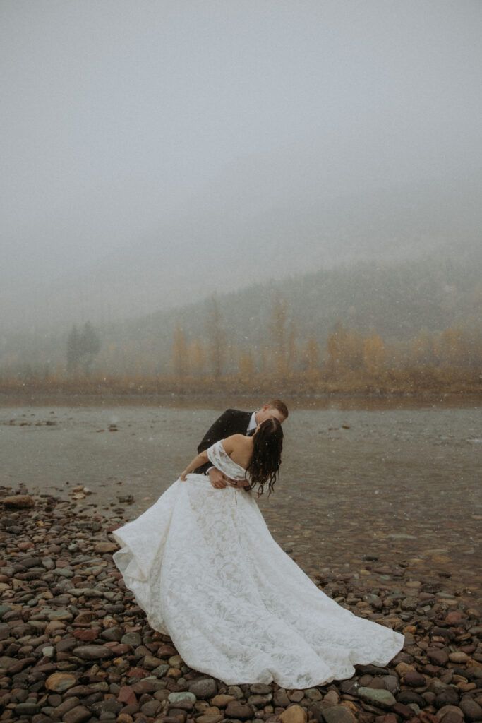 Newly married couple kissing